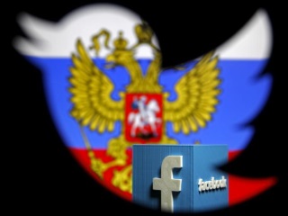 Фотоколлаж, сделанный в Зенице (Босния и Герцеговина) 22 мая 2015 г. Роскомнадзор предупреждает о возможной блокировке Google, Twitter и Facebook в России в случае несоблюдения ими российского законодательства о регулировании интернета. © 2015 Reuters
